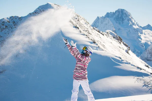 Female snowboarder in the alpine mountains — Stock Photo, Image