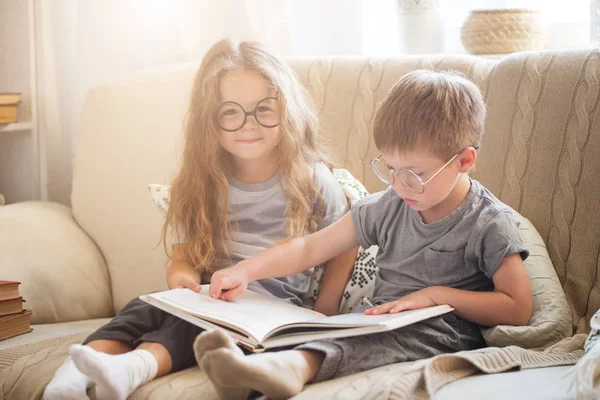 Little Brother Sister Reading Book Sofa — Stock Photo, Image