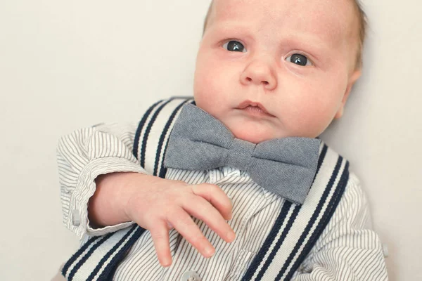 Newborn baby dressed like gentleman — Stock Photo, Image