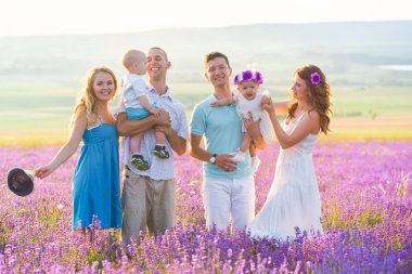 Two friendly family in a lavender field clipart