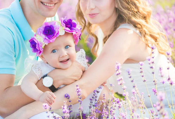 Young family in a lavender field — Stock Photo, Image