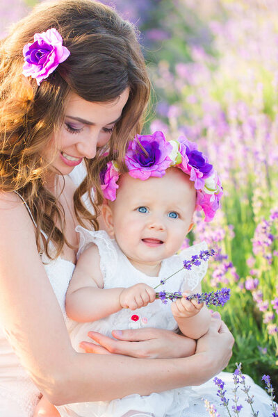 Mom and her daughter in a lavender field