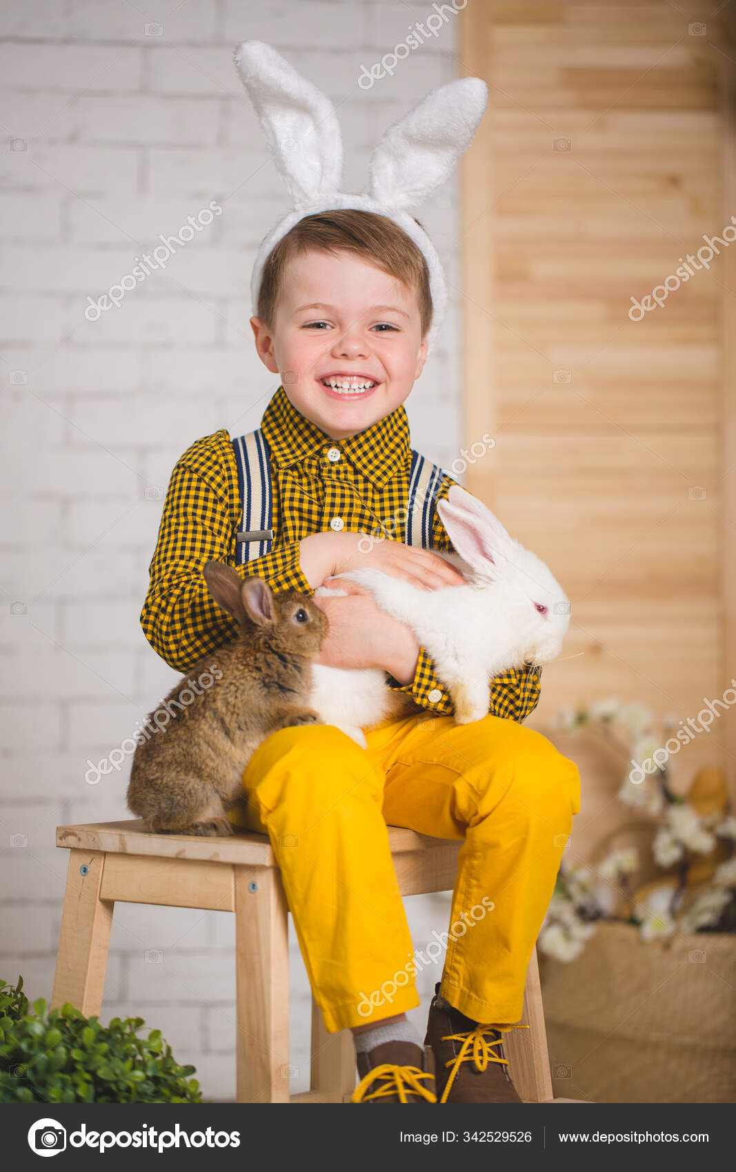 Boy with a rabbit Stock Photo by ©kirill_grekov 342529526