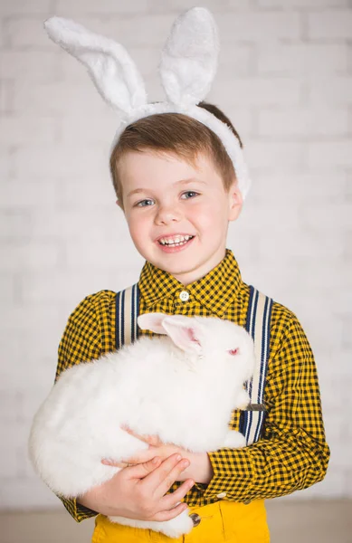 Boy with a rabbit — Stock Photo, Image