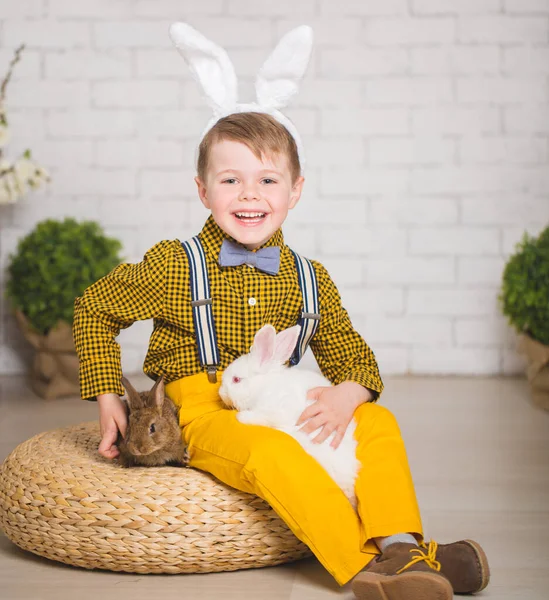 Boy with a rabbit — Stock Photo, Image