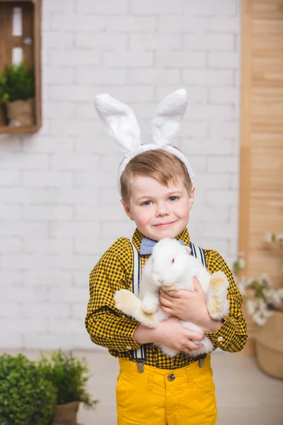 Boy with a rabbit — Stock Photo, Image