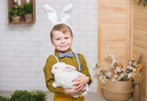 Boy with a rabbit — Stock Photo, Image