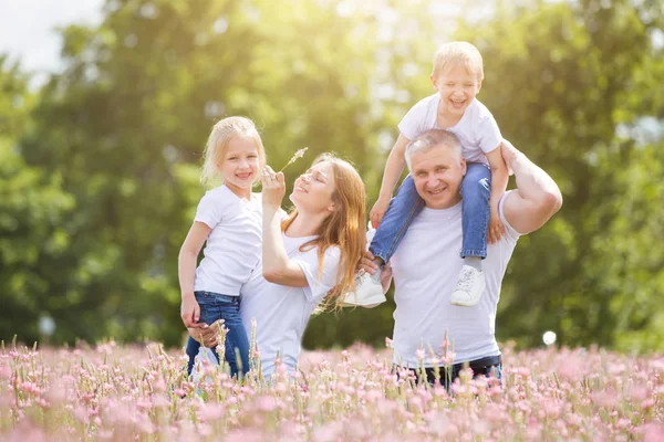 Family on holiday in the village — ストック写真