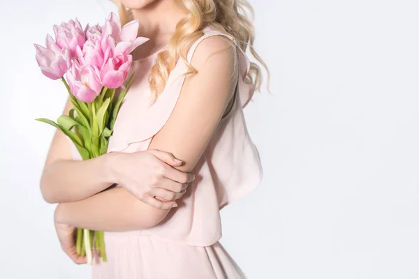 Luxurious blonde with a bouquet of tulips — 스톡 사진