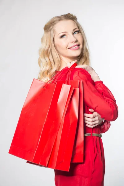 Girl with red packets — Stock Photo, Image