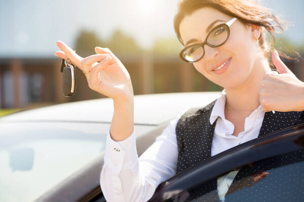Business woman in her car