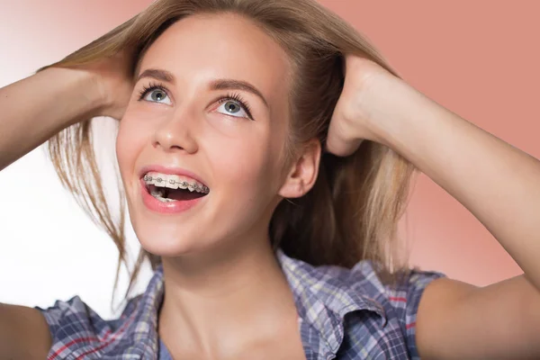 Portrait of teen girl showing dental braces. — Stock Photo, Image