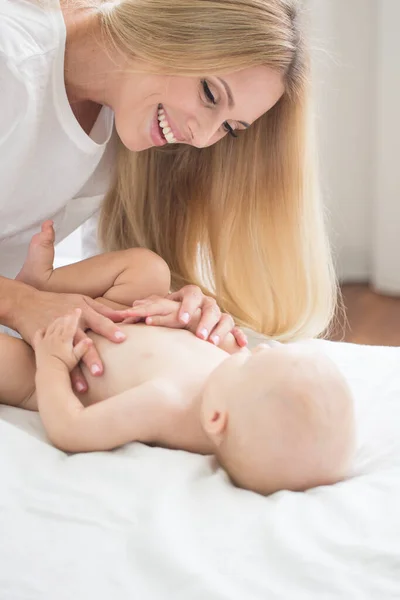 Mother Making Massage Her Infant Boy — Photo