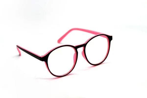 白い背景に分離されたモダンなピンクと黒のメガネ — ストック写真