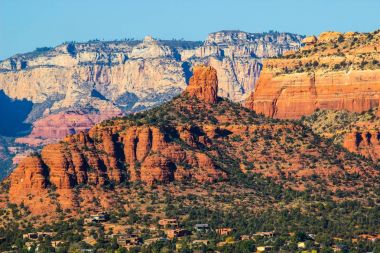 Red Rock Butte Overlooking Homes In Valley clipart