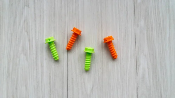 Juguete colorido tornillos — Foto de Stock
