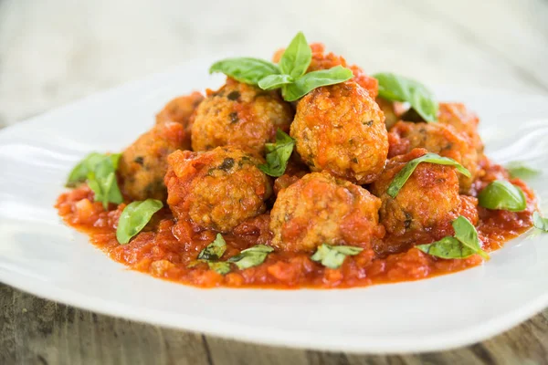 Beef Meatballs with tomato sauce and basil — Stock Photo, Image