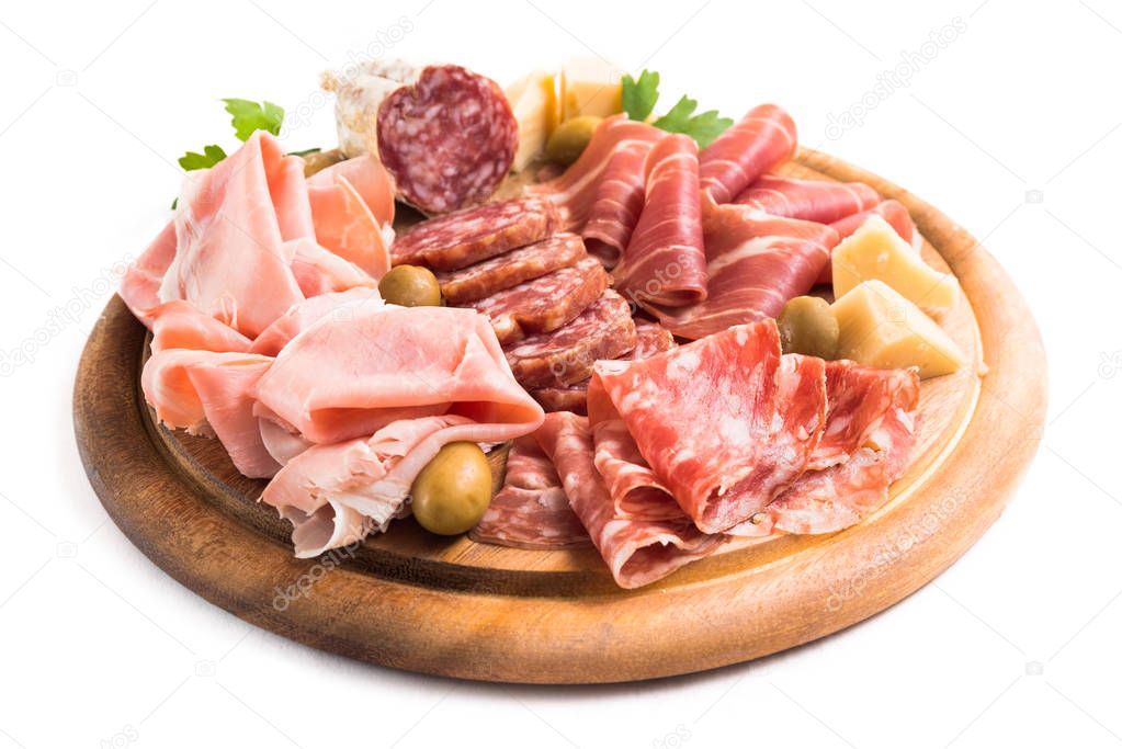 platter with prosciutto cotto ham, prosciutto crudo, slices of salami and parmigiano, Italian foods