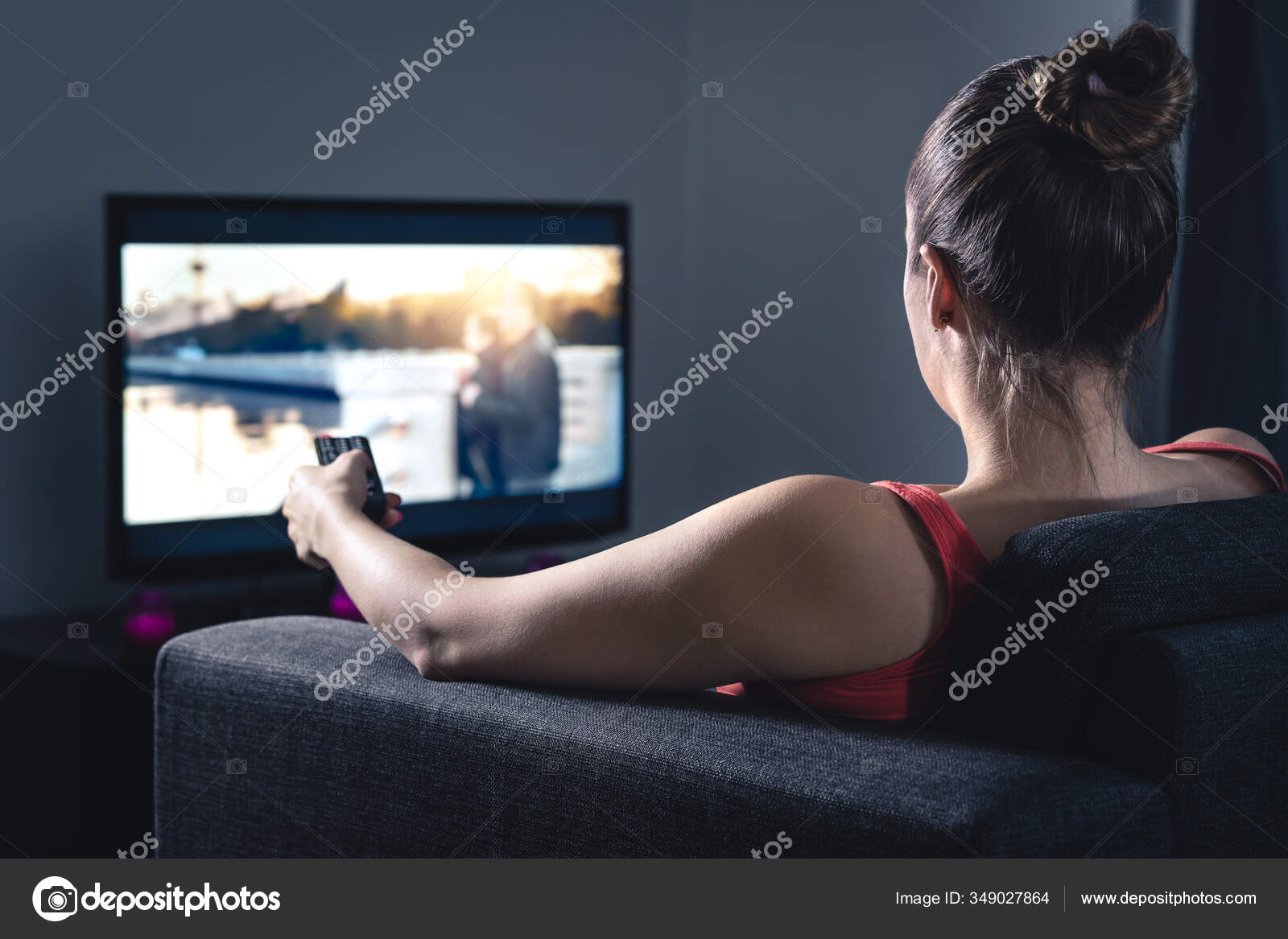 Woman Streaming Movie Watching Series Person Using Smart Remote Control Stock Photo by ©terovesalainen 349027864