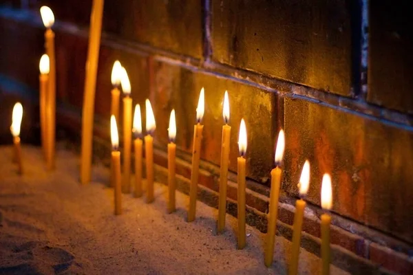 Candles Yellow Wax Lit Christian Church — Stock Photo, Image