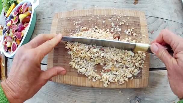 Woman chopping almonds — Stock Video