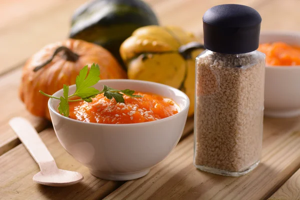 Pumpkin soup with ingredients — Stock Photo, Image