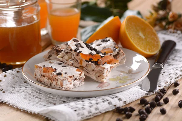 Nougat with almonds and orange — Stock Photo, Image