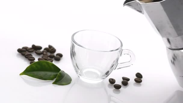 Pour the coffee into the cup - white background - slow motion — Stock Video