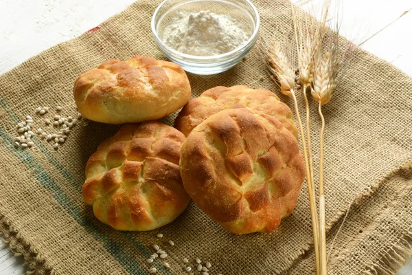 Barley flour bread on jute canvas — Stock Photo, Image