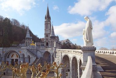 View of the cathedral-sanctuary of Lourdes (France) clipart