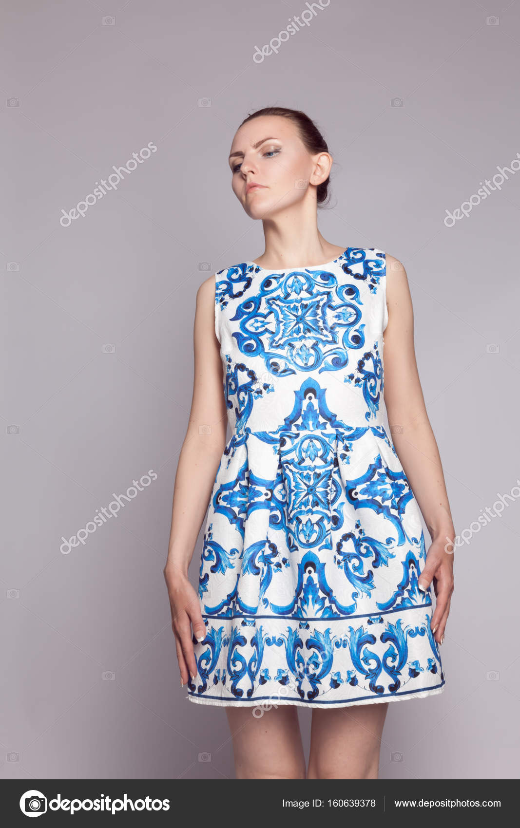 white dress with blue pattern