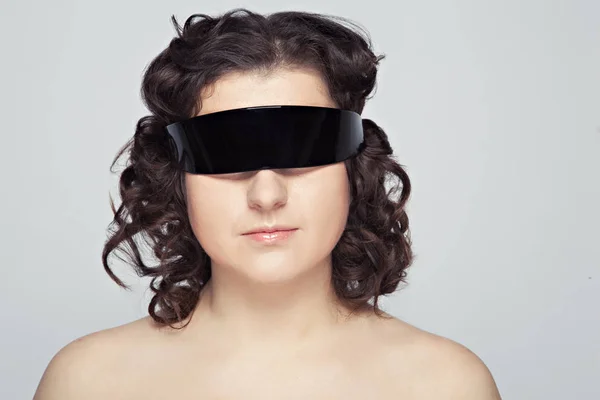 Portrait of a young girl with a black bandage on his head — Stock Photo, Image