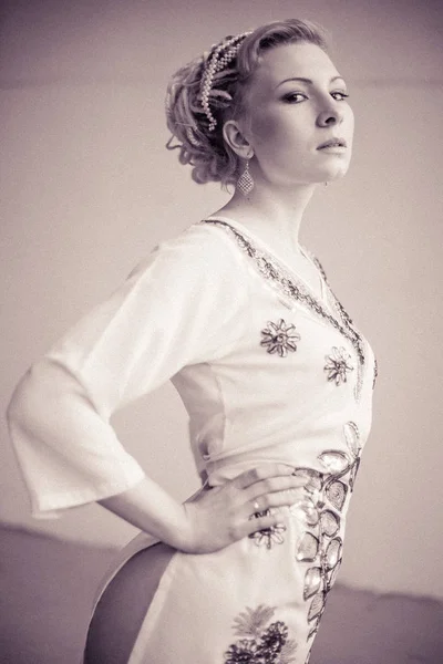 Black and white photos of a girl in an ethnic dress with embroidery and dreadlocks — Stock Photo, Image