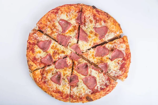Chopped pizza with ham — Stock Photo, Image