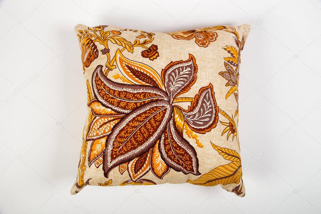 decorative cushions with patterned embroidery