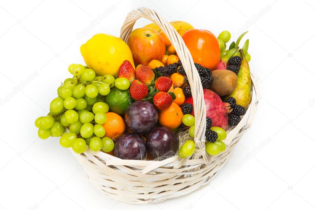 basket with fruits and berries, decorated with shiny flowers