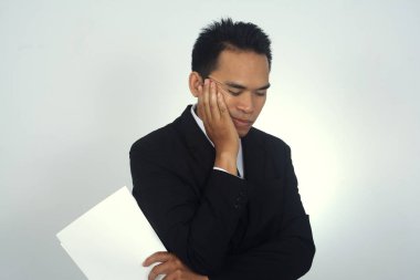 fotoğraf resim üzerinde beyaz izole üzgün ve stresli Asya iş adamı