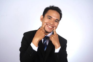 fotoğraf resim komik gülümseme ile genç Asyalı işadamı