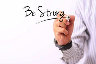 beyaz izole iş kavramı görüntü marker ve yazma tutan bir el güçlü