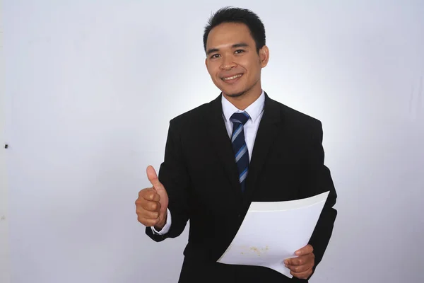 Fotó egy szép vonzó fiatal ázsiai üzletember a hüvelykujjával felfelé elszigetelt fehér kéz képe — Stock Fotó