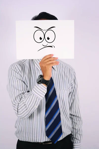 Biznesmen noszenie gniew maseczka do twarzy — Zdjęcie stockowe