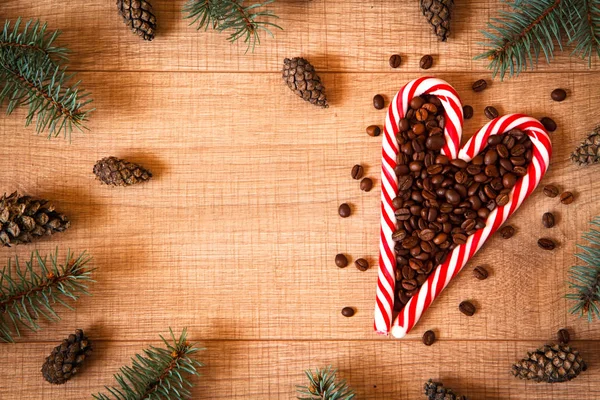 Una Composición Piruletas Con Granos Café Abeto Conos Plantilla Fondo — Foto de Stock