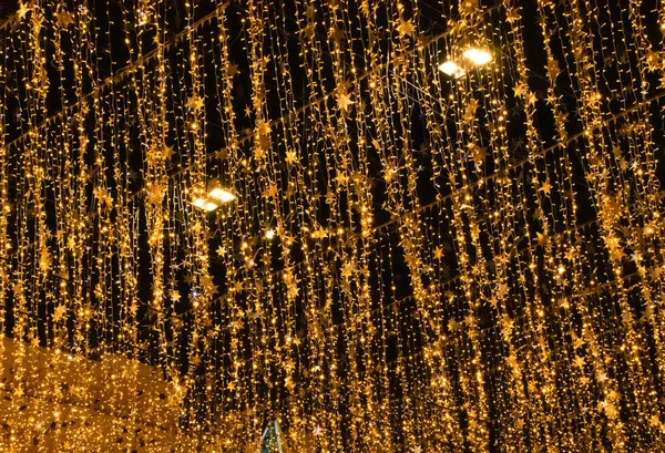 Guirlandes Avec Lumières Noël Comme Beau Fond Fête Doré Images De Stock Libres De Droits