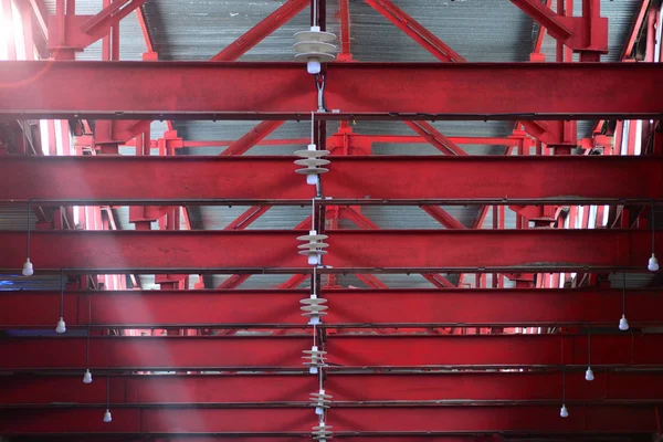 Metal beams under the roof of the factory