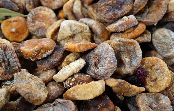 Dried figs background. Candied figs fruit close-up. Oriental sweets for tea.