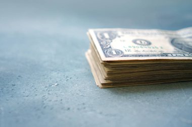 One dollar bills stack with copy space