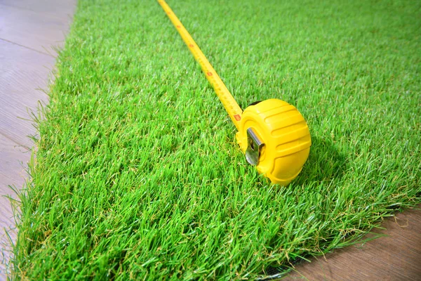 Artificial Grass Measure Tape Lie Laminate Floor — Stok fotoğraf