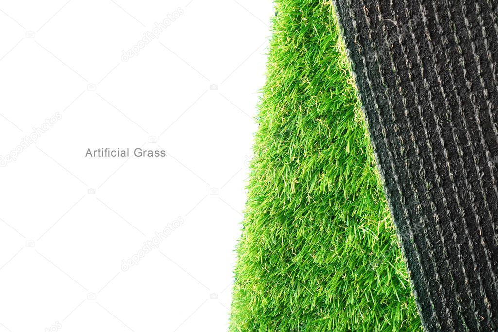 Green artificial turf roll on a white background, copy space. 