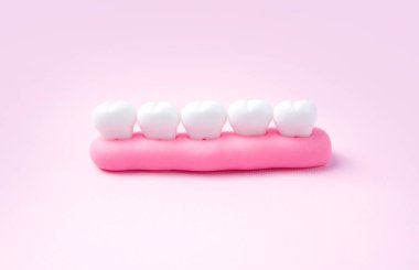 Diş konsepti. Plastikten yapılmış dişleri olan oyuncak sakız..