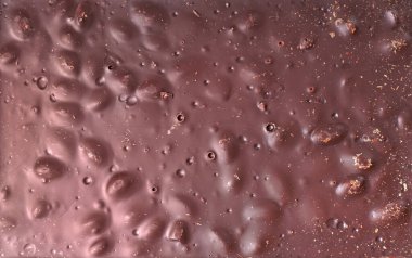 Fındık arkaplanlı çikolata çubuğu.